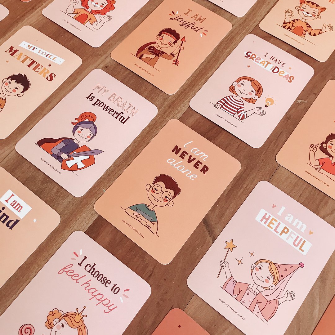 positive affirmation cards for kids on table with positive phrases and illustrations