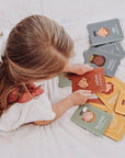 child with zones of regulation cards