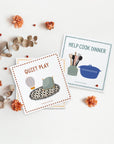montessori toys - toddler routine chart cards showing quiet play and help cook dinner cards with flowers in background