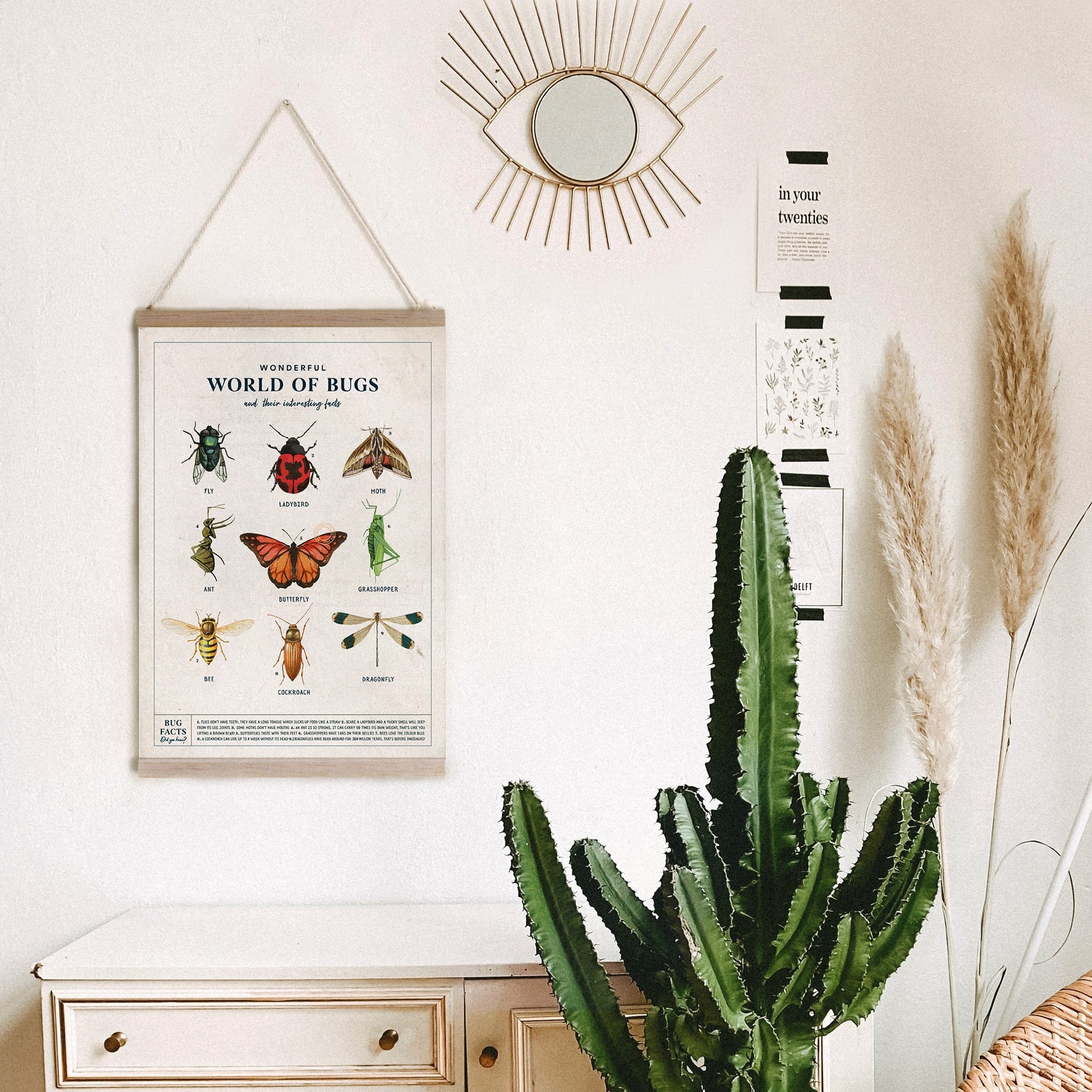 boho bedroom with vintage insect poster