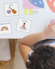child in classroom with morning routine cards
